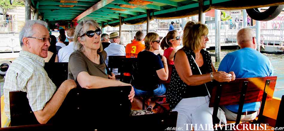 Tourists on Chao phraya river boat tour Bangkok with lunch