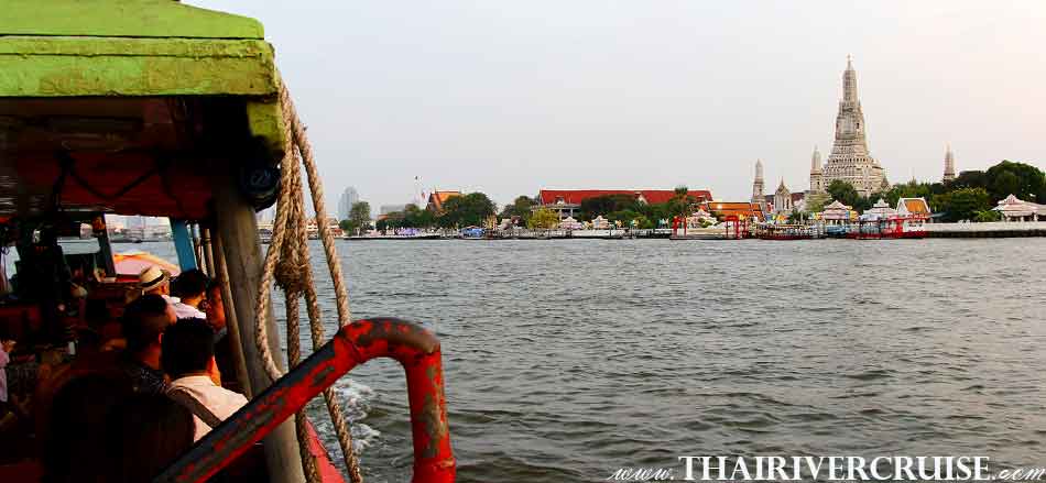 The Beautiful of Temple of dawn or Wat Arun from River Boat along Chao Phraya River Boat Tour Private Cruise Trip Bangkok   