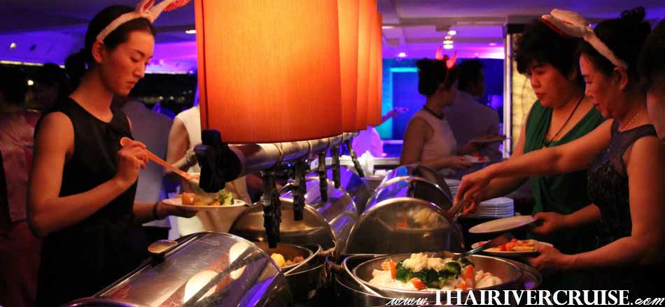 Delicious buffet food on board Chaophraya Cruise and Grand Chaophraya Cruise along Chaophraya river Bangkok Thailand.