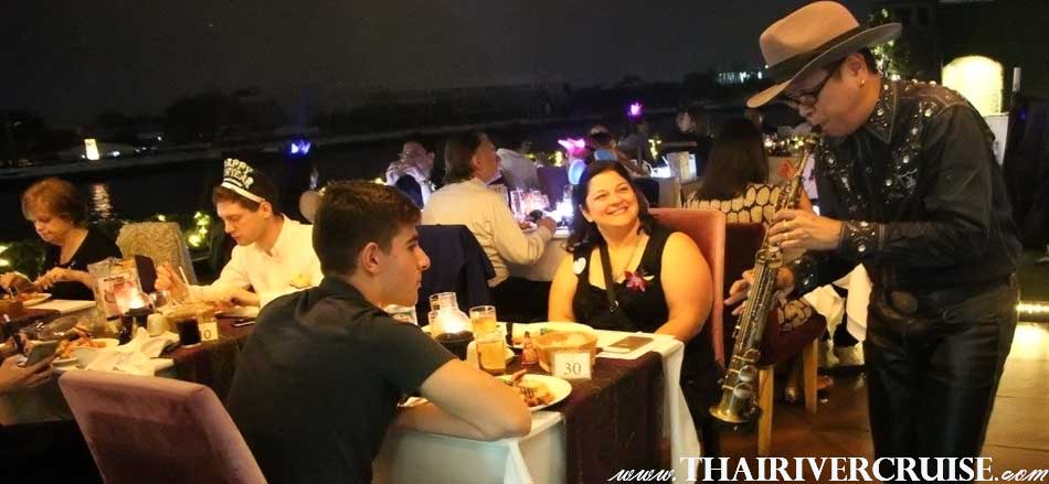Entertainment on board by Mr. Saxophone , Thai classical dancing and live music pop dance style. Chaophraya Cruise New Year Dinner River Cruise.Chaophraya Cruise New Year Dinner River Cruise, Let ’s Celebrate New Year Countdown Party Dinner Cruise Year 