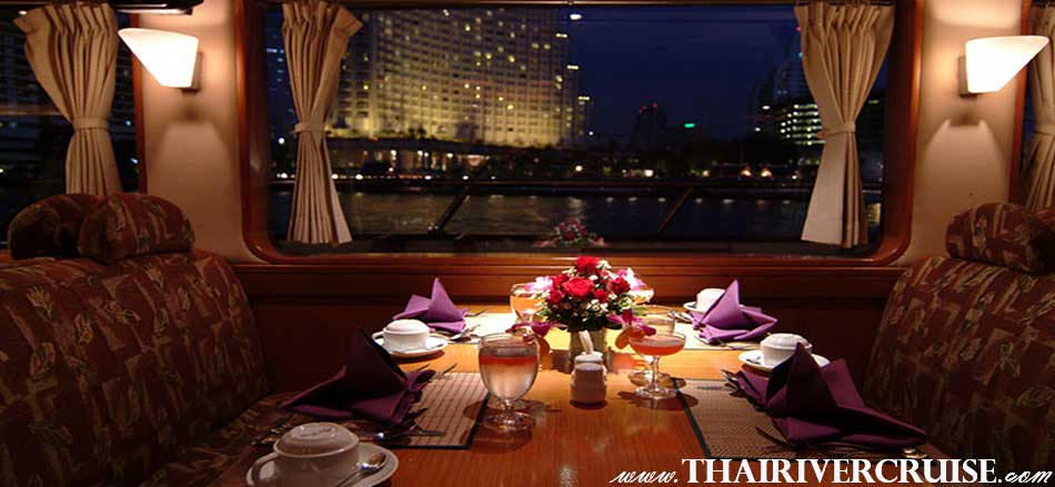 Grand Pearl Cruise luxury windows seat, Take in Bangkok's glittering night skyline aboard a Grand Pearl dinner cruise on the Chao Phraya river Bangkok Thailand