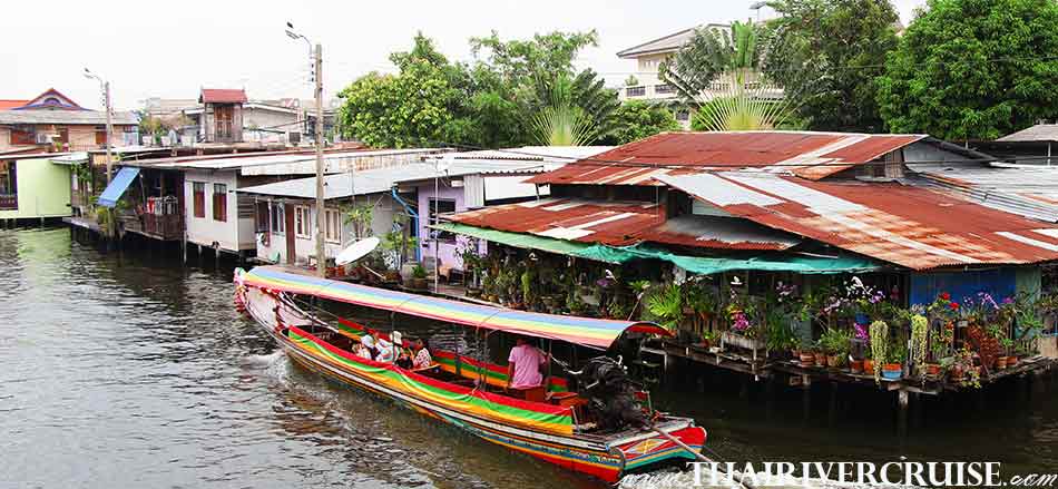 Enjoy onboard Chaophraya longtail boat klong tour thonburi canal trip Chaophraya river Bangkok Thailand