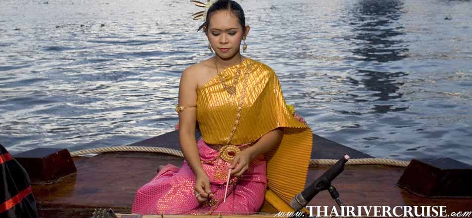 Journey into Thai culture and the Thai heart. Five star dining, traditional culture,entertainment performance by Thai music playing ( khim ),Loy Nava Dinner Cruise Bangkok Thailand