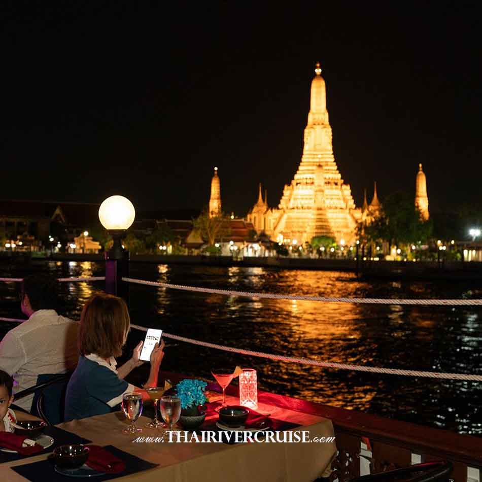 Rice Barge Cruise Bangkok Mahapatra Cruise Rice Barge Cruise Bangkok Mahapatra Cruise Thai dinner cruise Bangkok Chaophraya river Temple of Dawn Wat Arun from Mahapatra Cruise Bangkok Bangkok Rice Barge Dinner Cruise Traditional Boat traditional Thai cuisine along the majestic Chao Phraya River, the River of Kings Bangkok Maha Bhetra Cruise 