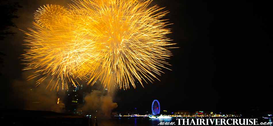 Sparks in the Bangkok New Year's Eve Firework Display over the Chaophraya river Bangkok Thailand