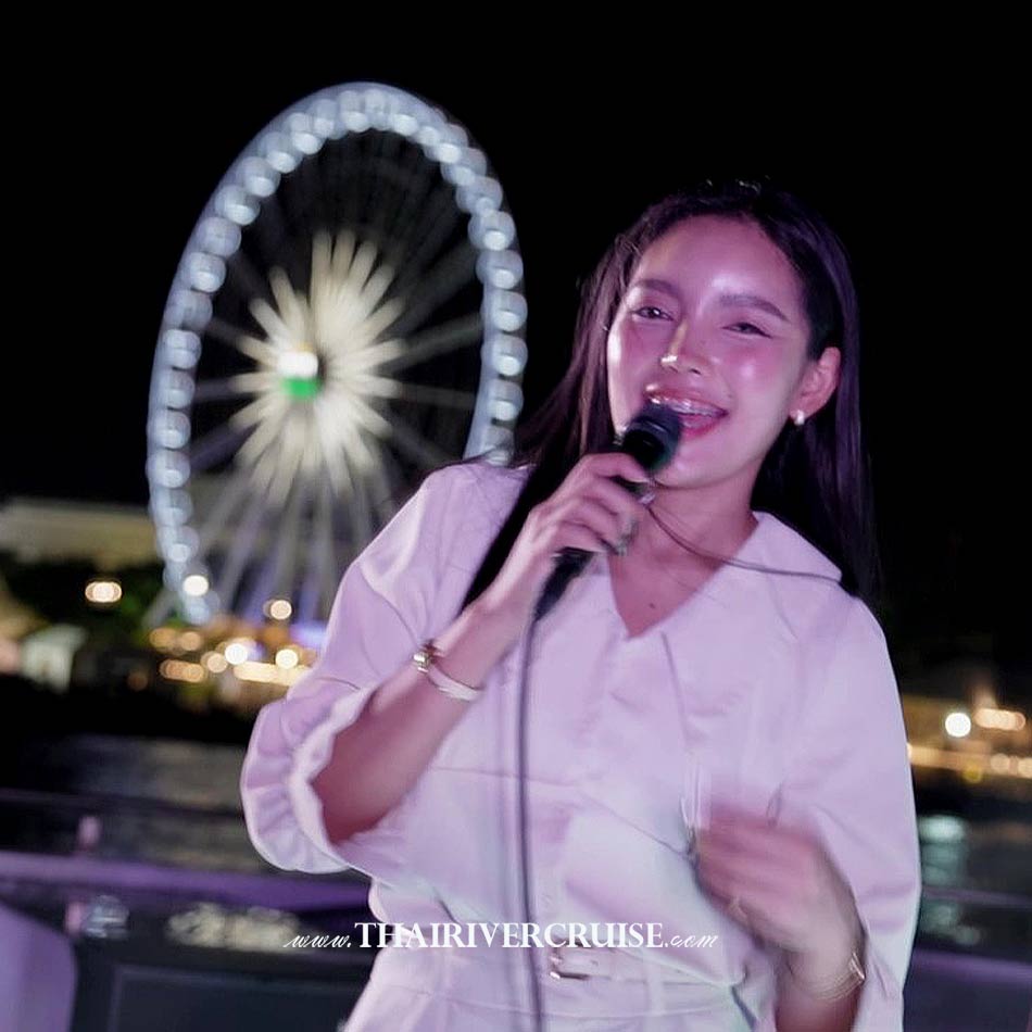 Dinner cruise Bangkok Sawasdee Chaophraya Cruise, Entertainment onboard with the live entertainment adds to the cultural experience and celebratory mood of the evening. A delightful evening filled with live music and beautiful singing. Our talented band creates a romantic yet joyful atmosphere for everyone to enjoy. Guests can sing along, dance, and relax while sharing memorable moments with friends, family, and loved ones on the cruise.