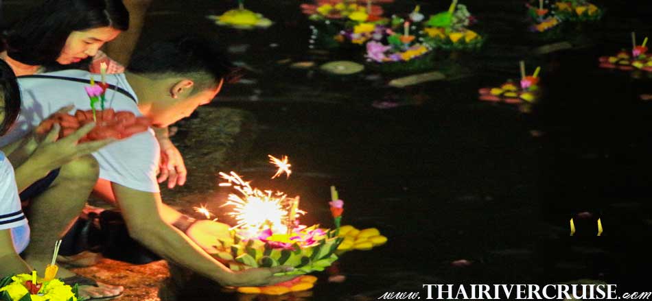 Thai people is floating the Kratong on Loykratong festival Bangkok Thailand