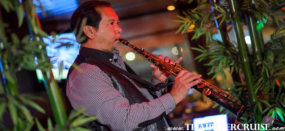 Saxophone Music in Jazz song,  Entertainment on board White Orchid River Cruise by Thai classical dancing cabaret show and live band music,White Orchid River Cruise Bangkok Dinner Cruise Discount Promotion Best Price 