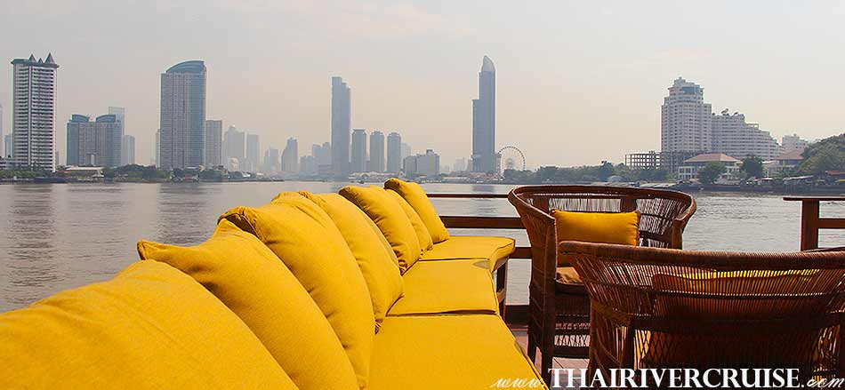 Enjoy to see the Bangkok city town view from the Boat with Rooms Bangkok  Private luxury cruise rice barge 5-star 2 cabin boat on the Chaophraya river Bangkok Thailand. 